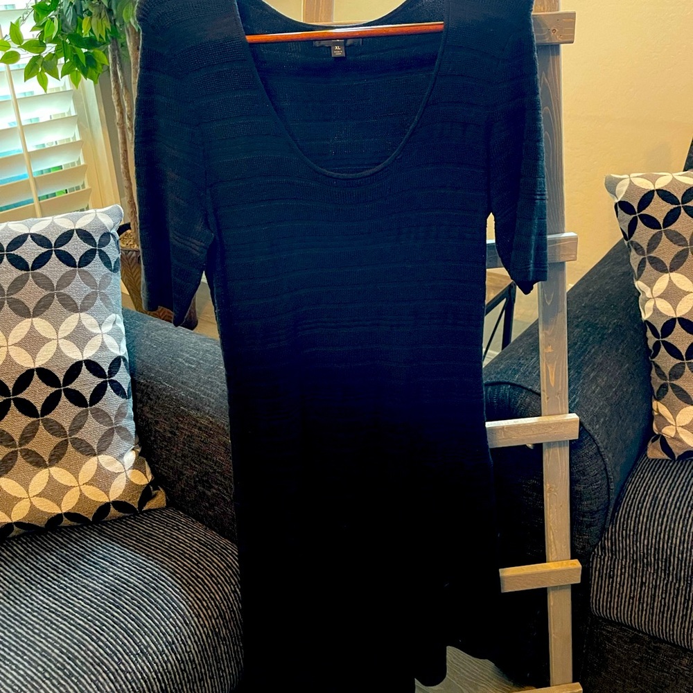 Solid black dress- cute material, almost like a sweater.